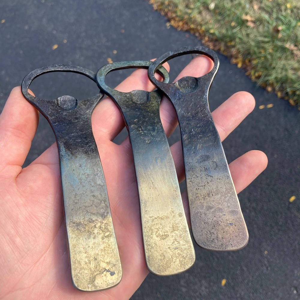 Hand forged bottle opener